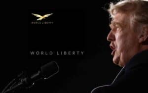 Donald Trump speaking into a microphone next to a World Liberty Financial logo