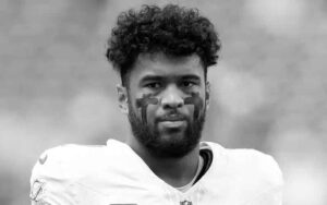 a close up of Tua Tagovailoa in black and white