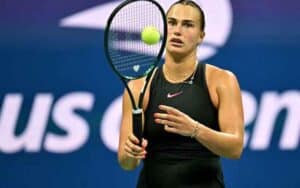 Aryna Sabalenka holding a racket at the US Open