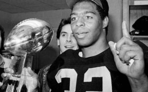 Marcus Allen with the Lombardi Trophy