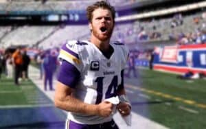 Sam Darnold running off the field with a purple glow