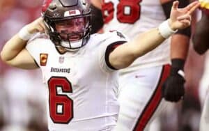 Baker Mayfield pointing indicating a first down