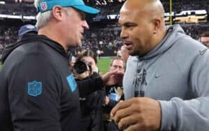 Doug Pederson and Antonio Pierce meeting after a game