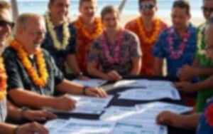 men wearing leis betting on sports