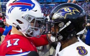 Josh Allen and Lamar Jackson talking after a game