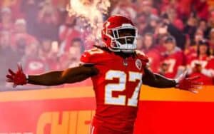 Kareem Hunt celebrating with fire going off in the background