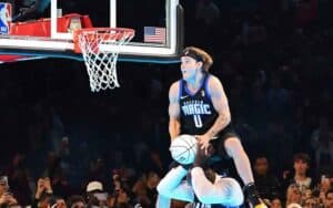 Mac McClung dunking a basketball