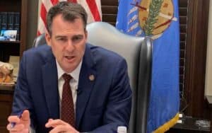 Oklahoma Governor Kevin Stitt at his desk
