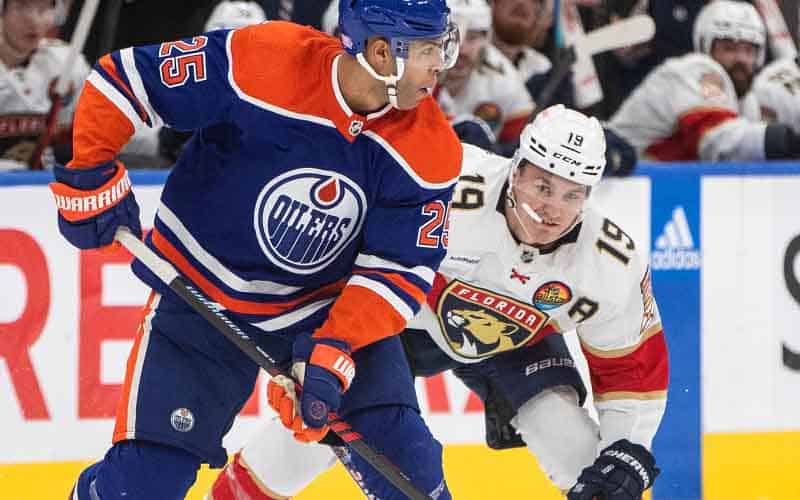 a player for the Edmonton Oilers and Florida Panthers competing