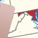 a pink mobile phone and the state of MD colored in red