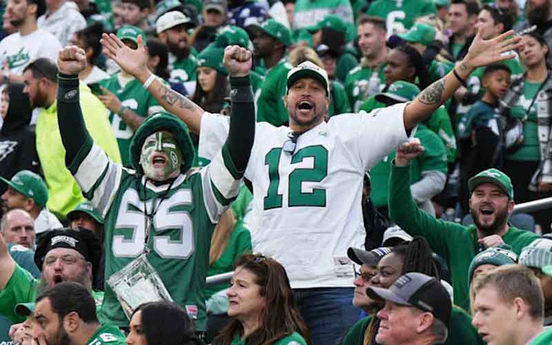 Eagles fans cheering in the stands