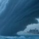 a hurricane making landfall on a coastal city