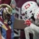 A D.C. Defenders and Michigan Panthers lineman on the line of scrimmage