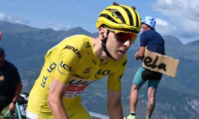 Tadej Pogacar racing in the 2025 tour de France