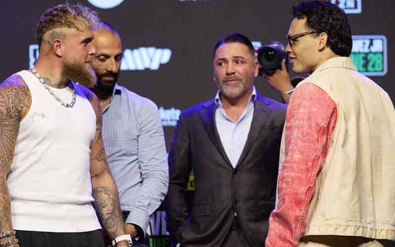 Jake Paul and Julio Caesar Chavez Jr. facing off at a press conference