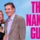 Pamela Anderson and Liam Neeson standing next to a logo for The Naked Gun