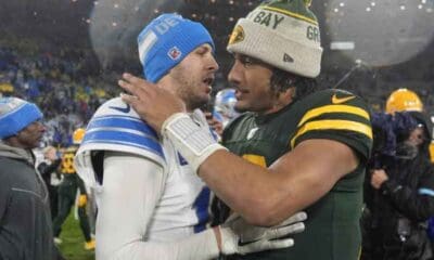 Jared Goff giving Jordan Love a hug after a Lions Packers game