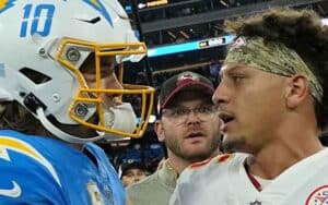 Patrick Mahomes and Justin Herbert talking after a game