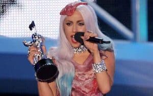 Lady Gaga holding an MTV VMA Award