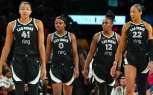 four members of the 2025 Las Vegas Aces walking with swagger