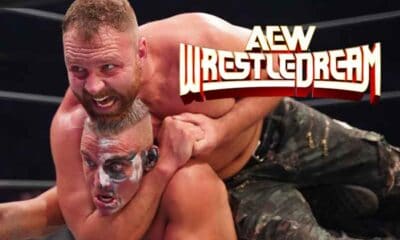 Jon Moxley with Darby Allin in a choke hold next to an AEW WrestleDream logo