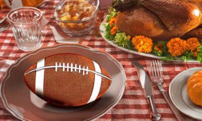a football as part of a Thanksgiving table setting
