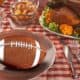a football as part of a Thanksgiving table setting