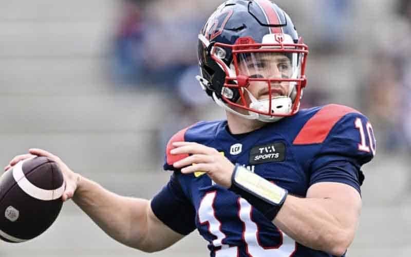 Davis Alexander throwing a pass for the Montreal Alouettes
