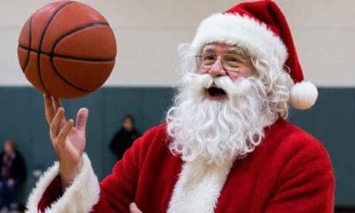 Santa about to spin a basketball