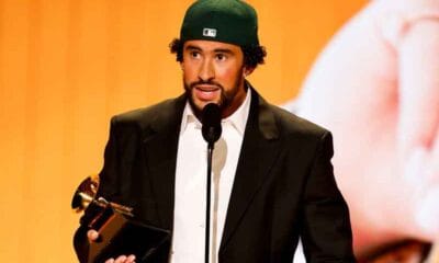 Baf Bunny holding a Grammy on stage