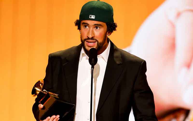 Baf Bunny holding a Grammy on stage