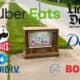 A TV on the curb with a SB LX logo and brand logos that will appear in SB ads