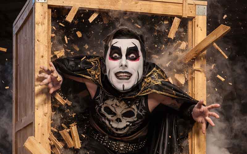 Danhausen emerginf from the Elimination Chamber Mystery Crate