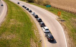 cars pulled off on the side of an interstate exit