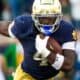 Jeremiyah Love running the ball for Notre Dame