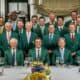 A group of former winners of The Masters with green jackets