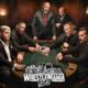 WWE Superstars playing poker above a WrestleMania Vegas logo