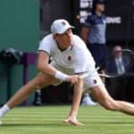 Jannik Sinner slipping at Wimbledon
