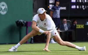 Jannik Sinner slipping at Wimbledon