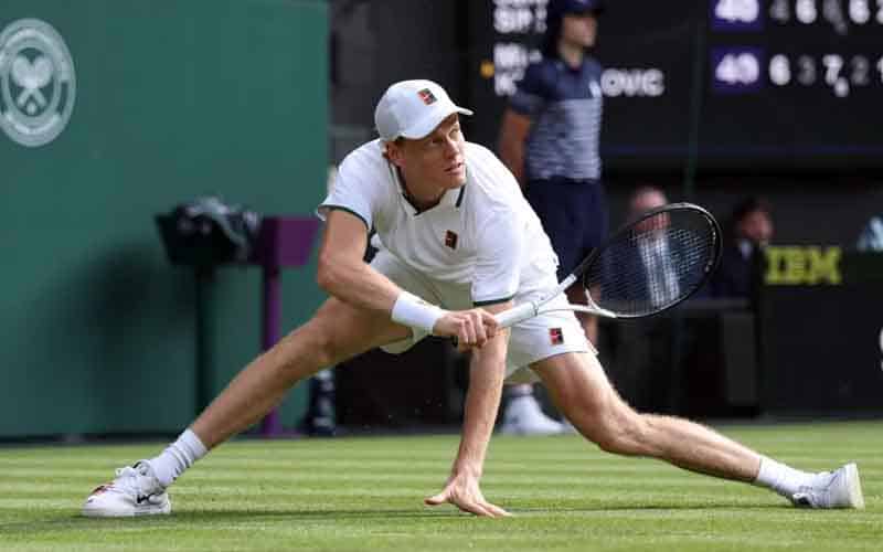 Jannik Sinner slipping at Wimbledon
