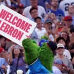 Phillie Phanatic holding up a Welcome LeBron sign