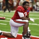 Rueben Bain Jr. of the Tampa Bay Buccaneers taking a knee
