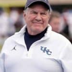 Bill Belichick with a UNC polo shirt on