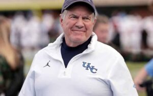 Bill Belichick with a UNC polo shirt on