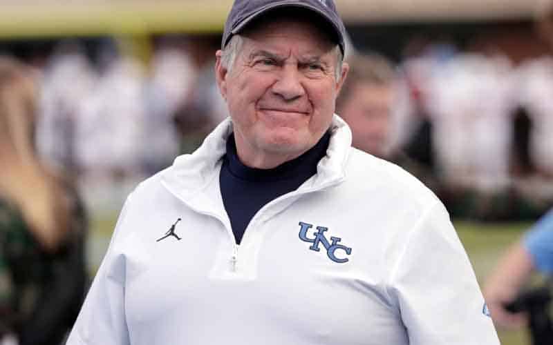 Bill Belichick with a UNC polo shirt on