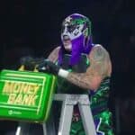 Penta claiming the Money In The Bank briefcase
